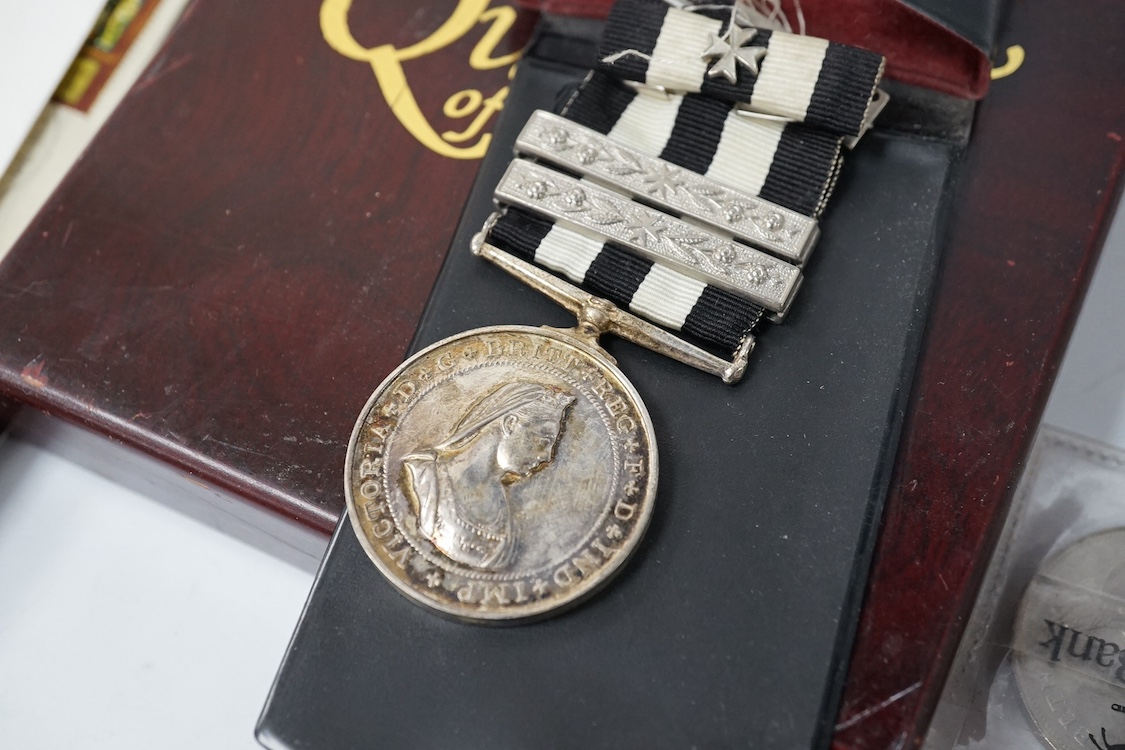 A Service Medal of the Order of St John’s with two clasps, together with a United Kingdom brilliant uncirculated coin collection 2008, plus a few other items. Condition - fair.